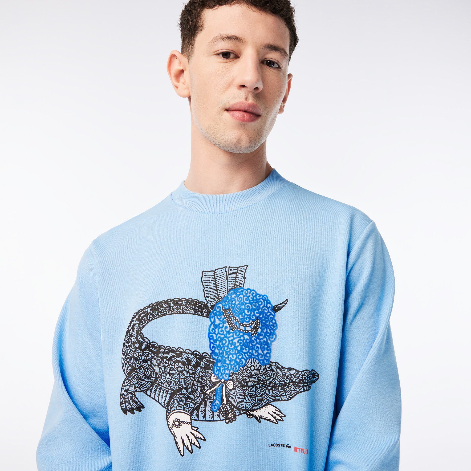 Lacoste x Netflix Erkek Regular Fit Bisiklet Yaka Baskılı Açık Mavi Sweatshirt