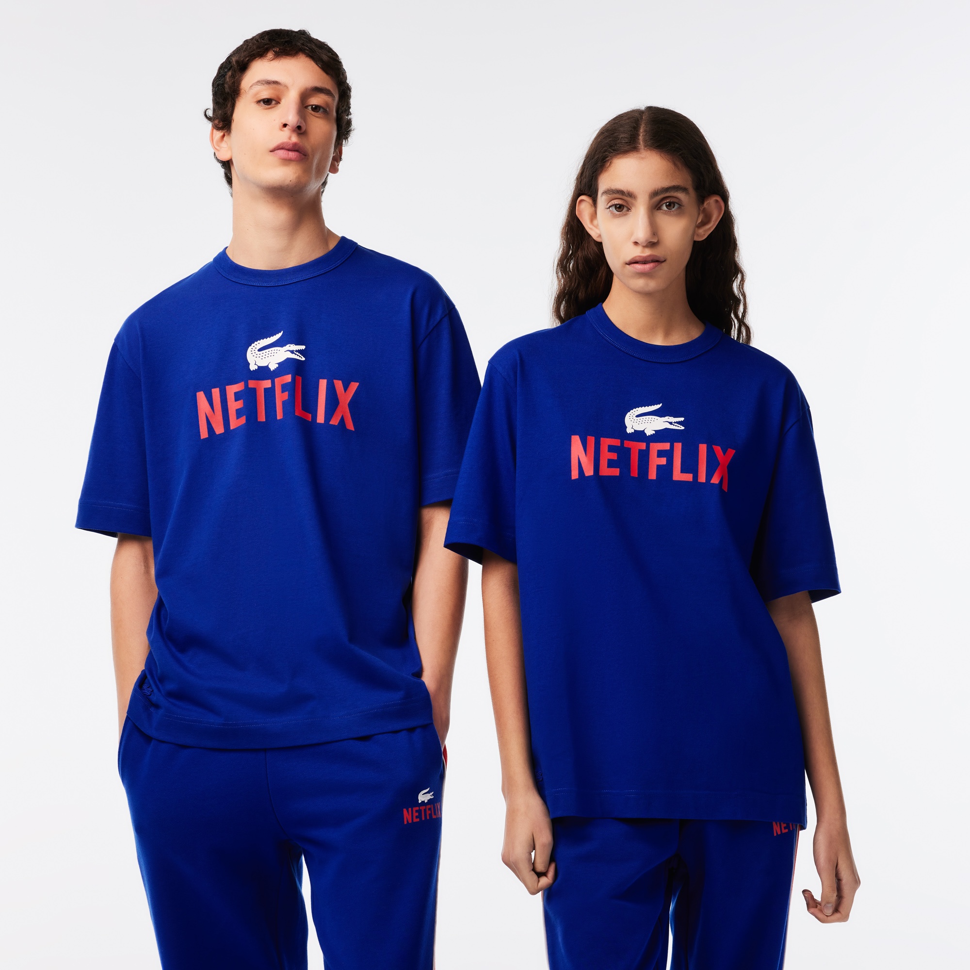 Lacoste x Netflix Unisex Loose Fit Bisiklet Yaka Baskılı Lacivert T-Shirt