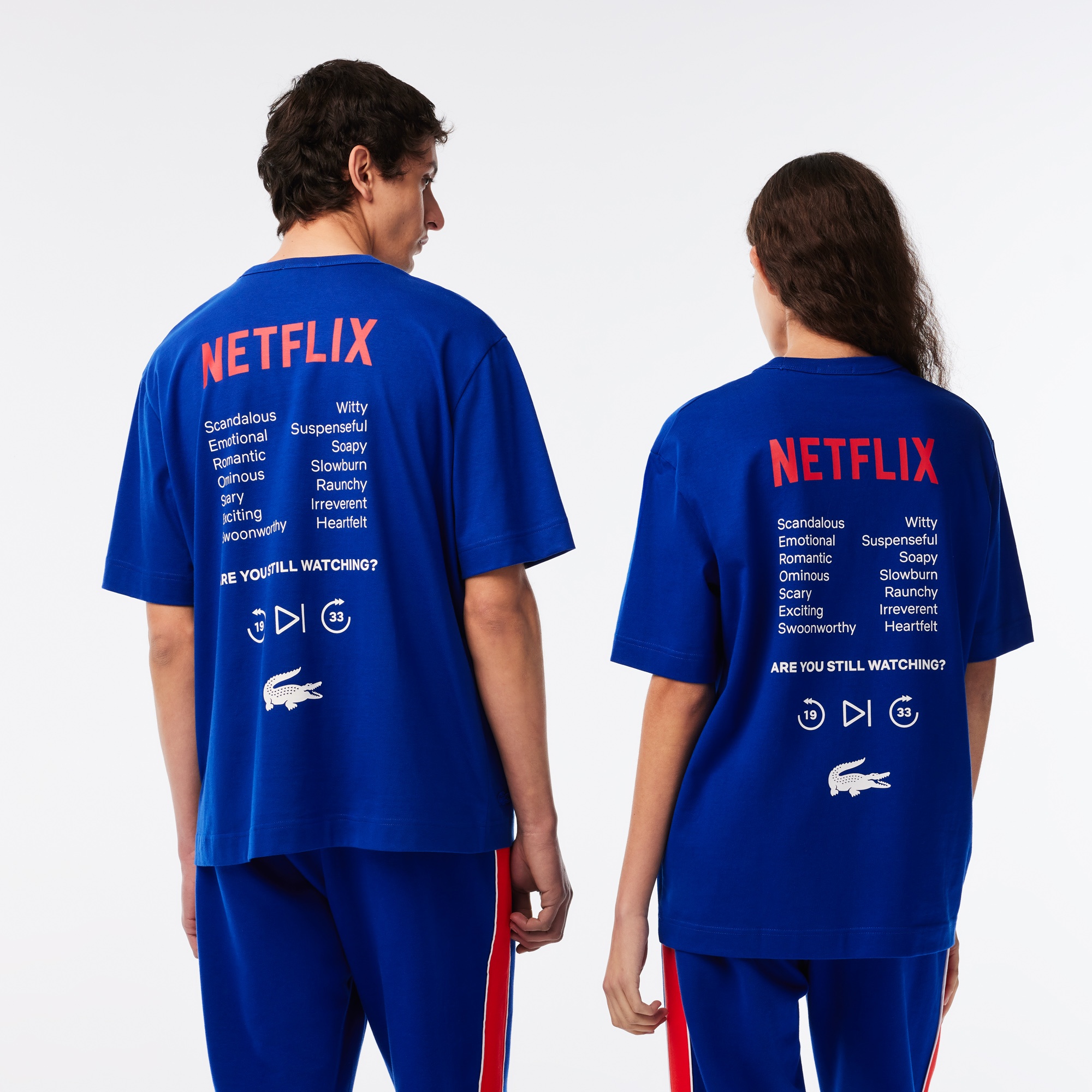 Lacoste x Netflix Unisex Loose Fit Bisiklet Yaka Baskılı Lacivert T-Shirt